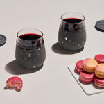 Charcoal Terrazzo Soft silicone wrap over clear glass — this infinitely reusable glass is great for wine, cocktails, & more on the go.