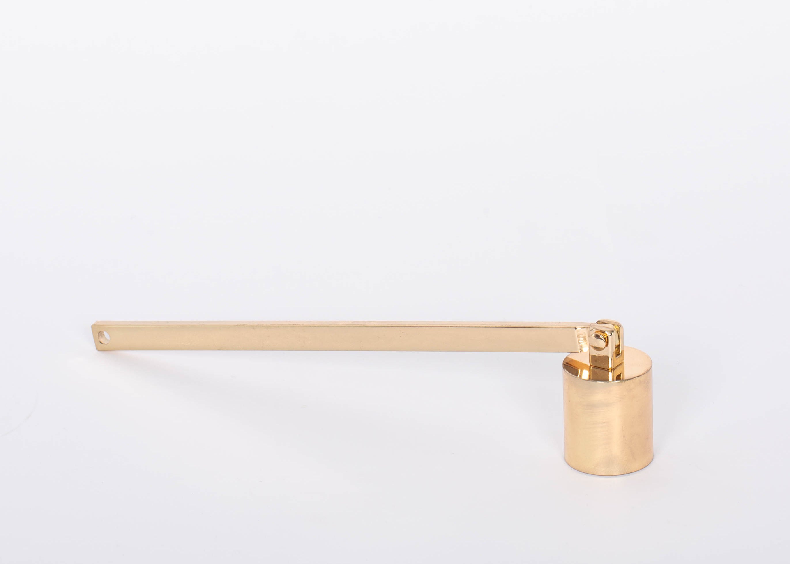 Golden Candle Snuffer by Designworks. White background.