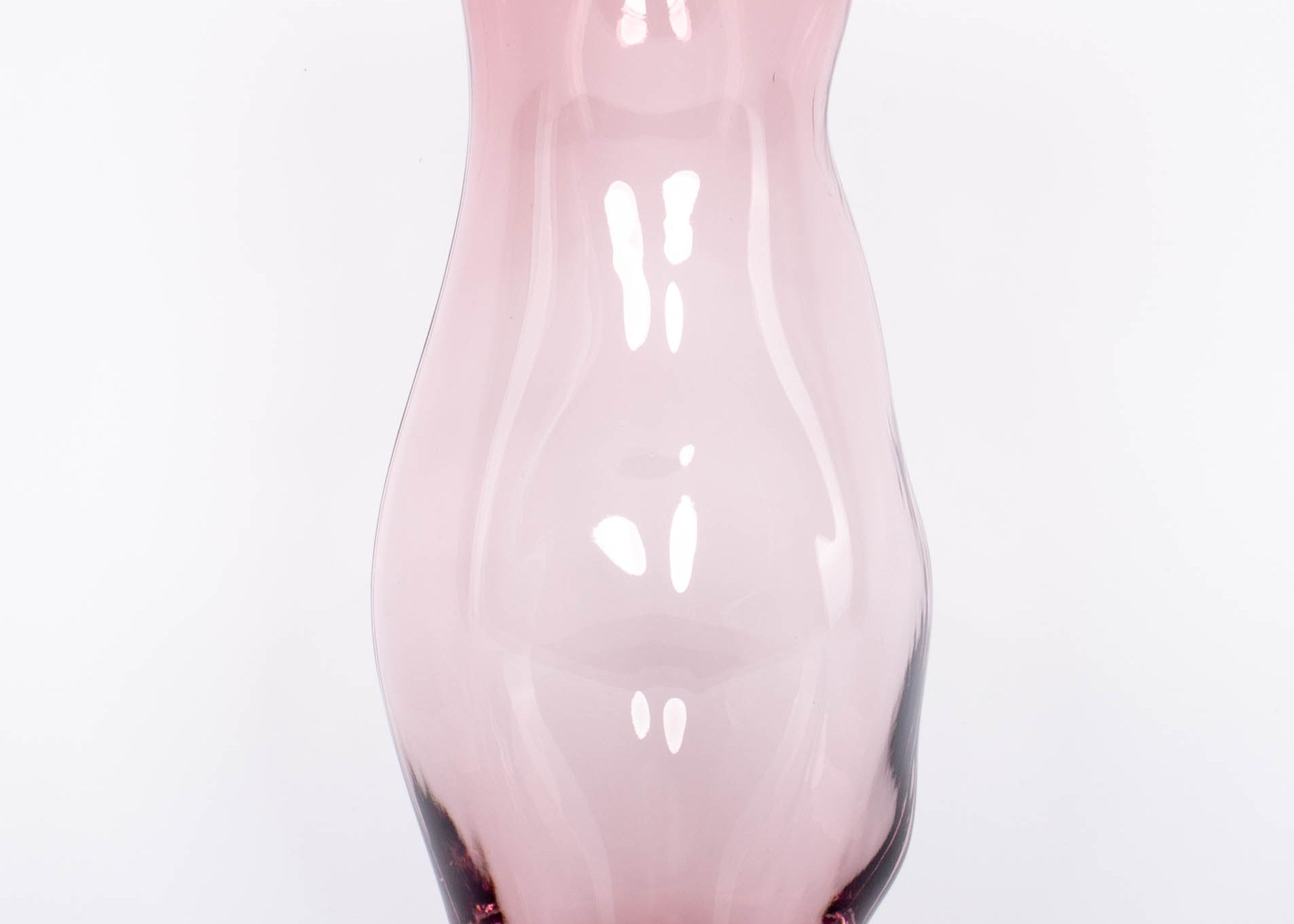 Minimal purple hued and mouth blown Onda Pitcher by Accent Decor.