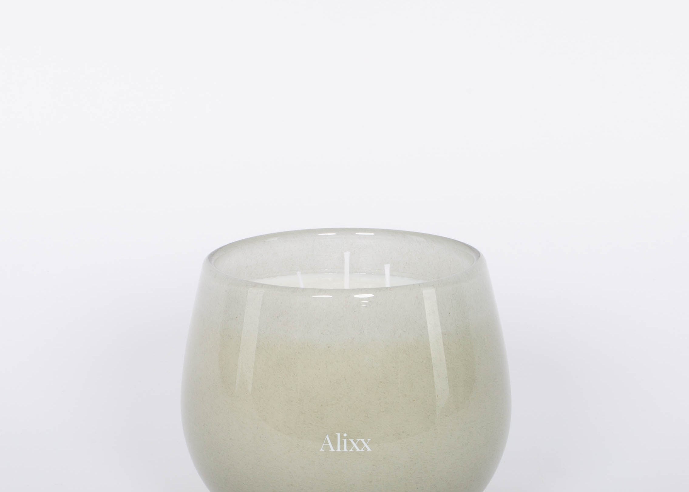 Paris inspired Salon De Tabac white two wick candle by Alixx with earthy oak wood, warm bourbon, and sweet plum nectar fragrance.  White background.