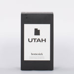 Black box with white label and black Utah outline for soy wax hand poured Utah Candle by Homesick.