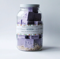 Dot & Lil Lavender & Hibiscus Sparkling Milk Bath Cubes, purple cubes stamped D&L in a glass jar