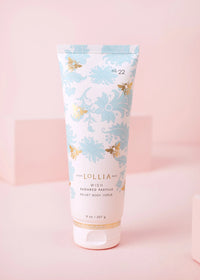 Lollia Wish Velvet Body Scrub tube with golden bees on blue foulard