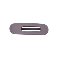 Oval lay flat claw clip in Grey Lilac, mini size, a matte dusty lilac hair claw clip with an open center, on a white background.