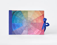 RoomyTown Color Wheel Artist Sketchbook with a rainbow color wheel cover and blue ribbon tie