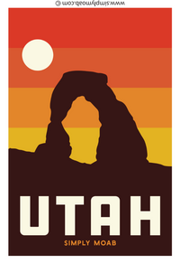 Utah magnet with Delicate Arch in silhouette against banded coral and gold sunset