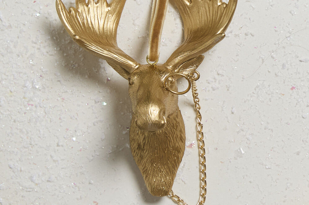 E + E Ornaments, seventh view, a close look at the gold moose and its monocle chain