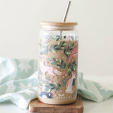 1canoe2 Woodland Animals Glass Can with iced coffee on a wooden coaster by a green cloth