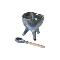Azul Footed Bowl, the blue reactive glaze stoneware bowl on three hand shaped legs with its small spoon.