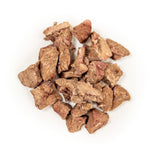 Brown pet treats on a white background