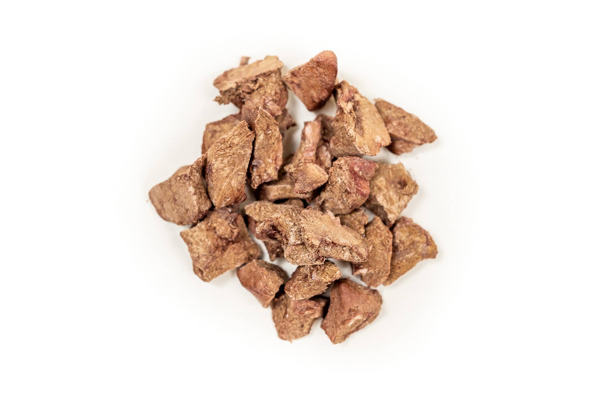 Brown pet treats on a white background