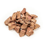 Brown pet treats on a white background
