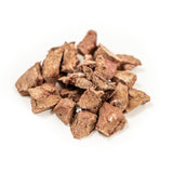Brown pet treats on a white background