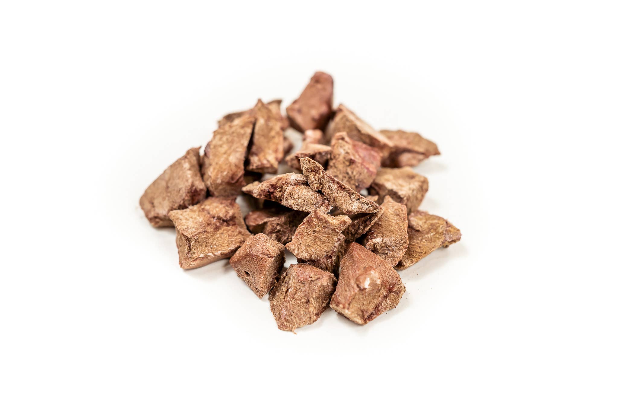 Brown pet treats on a white background