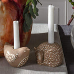 Fox Bramley Candle Holder. Intricate design features carefully crafted metal branches that cradle the candle for a unique and romantic look. Incredibly versatile, this piece can be used to create an intimate ambiance or simply as a beautiful home accent.