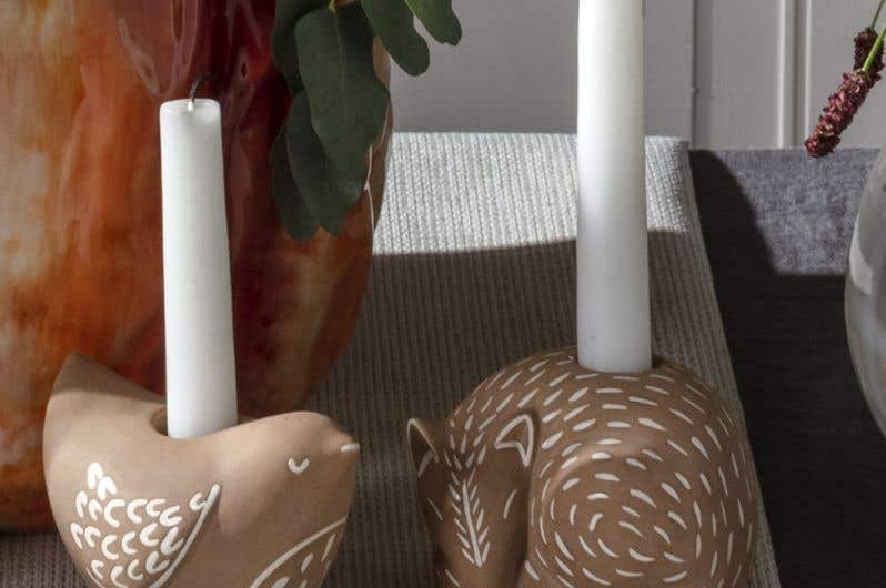 Fox Bramley Candle Holder. Intricate design features carefully crafted metal branches that cradle the candle for a unique and romantic look. Incredibly versatile, this piece can be used to create an intimate ambiance or simply as a beautiful home accent.