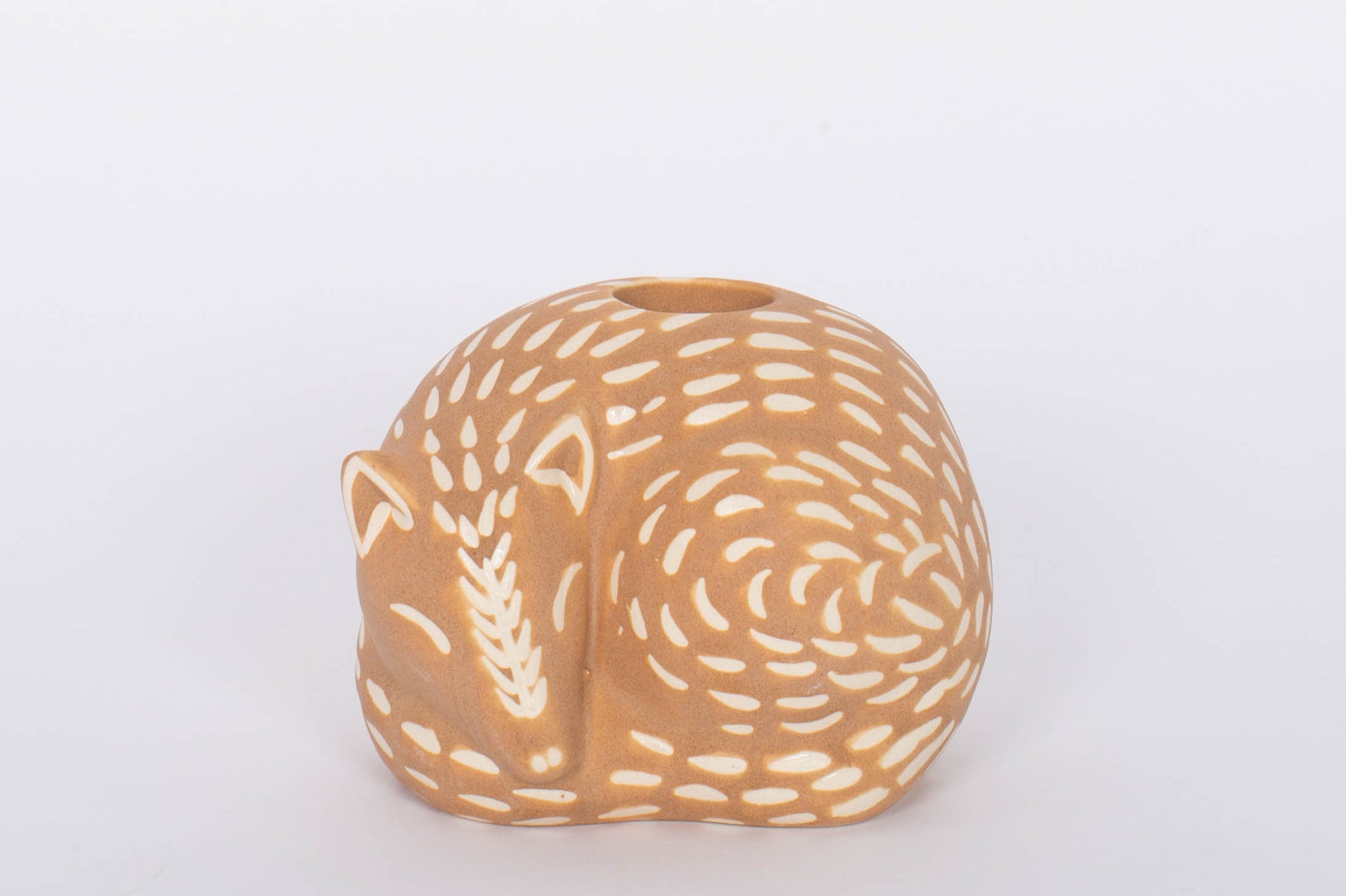 Fox Bramley Candle Holder. Intricate design features carefully crafted metal branches that cradle the candle for a unique and romantic look. Incredibly versatile, this piece can be used to create an intimate ambiance or simply as a beautiful home accent.