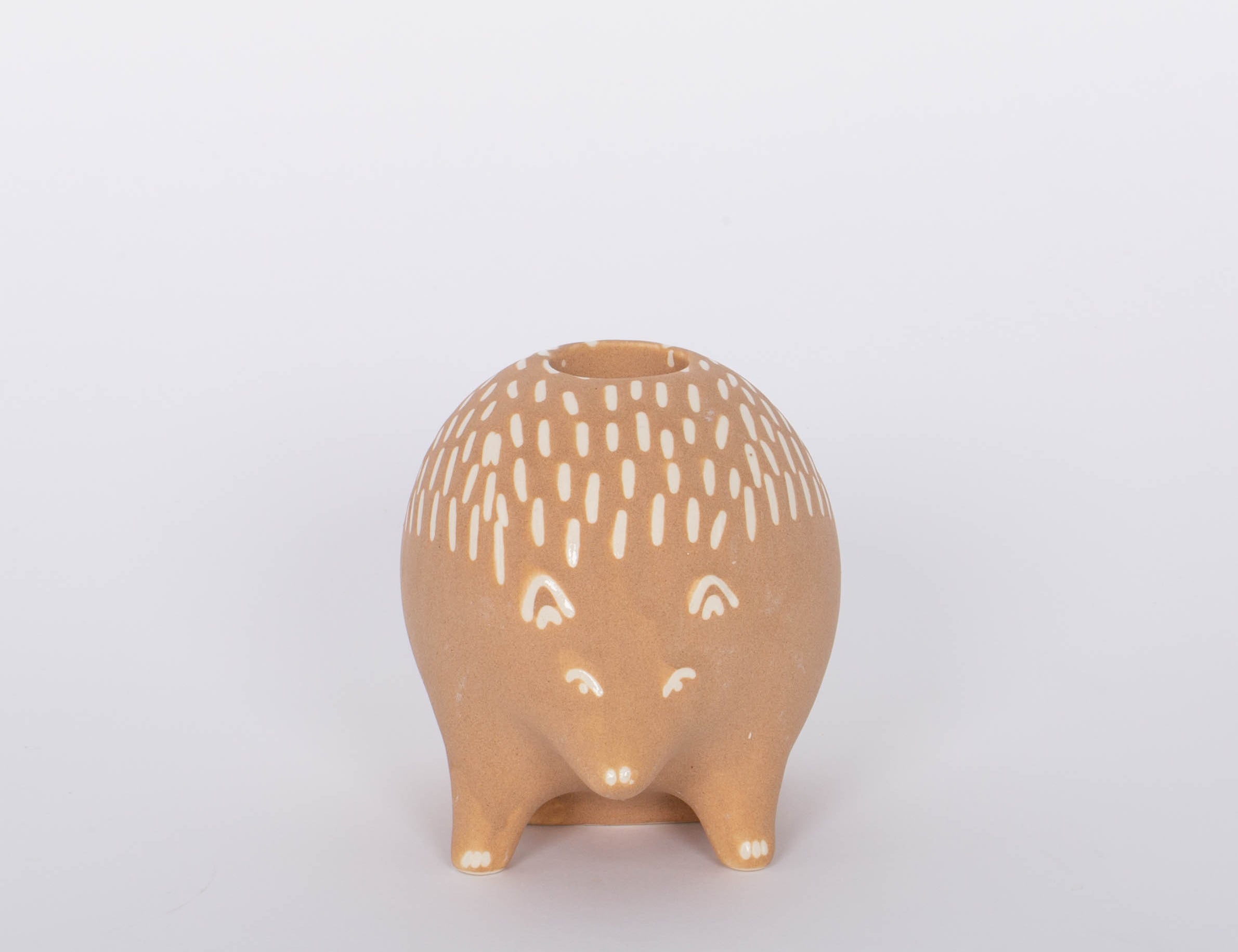 Hedgehog Bramley Candle Holder. Intricate design features carefully crafted metal branches that cradle the candle for a unique and romantic look. Incredibly versatile, this piece can be used to create an intimate ambiance or simply as a beautiful home accent. 