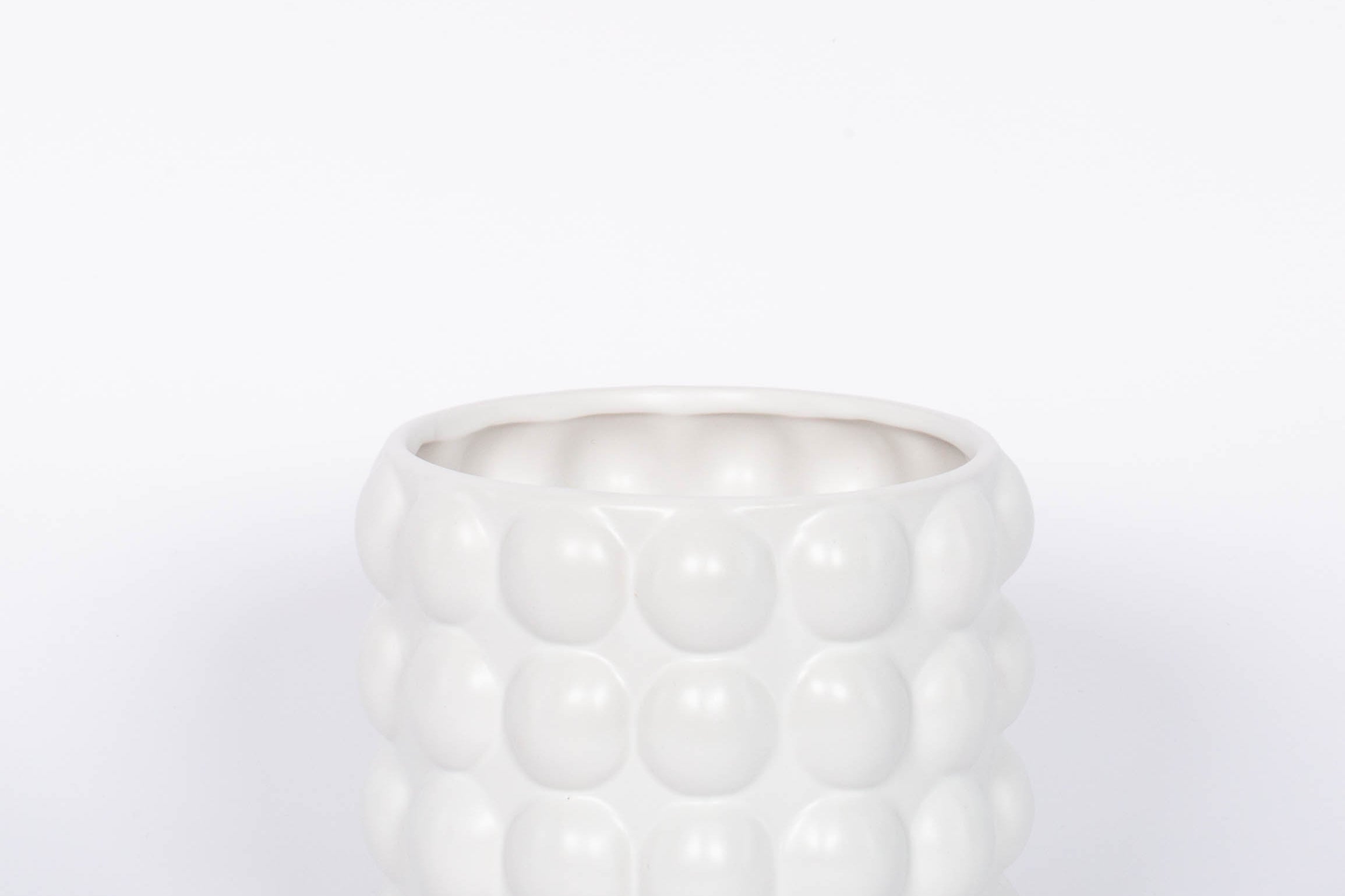 Mindful Modern collection Bubble pot matte white finish and four rows of bubbles. Fits a 4.5 drop in orchid pot.  White background.
