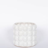 Mindful Modern collection Bubble pot matte white finish and four rows of bubbles. Fits a 4.5 drop in orchid pot.  White background.