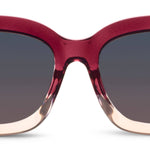 Red sunglasses with a gradient effect on a white background