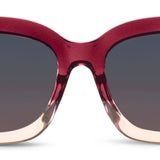 Red sunglasses with a gradient effect on a white background