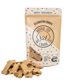 Dog treats with a branded packaging on a white background