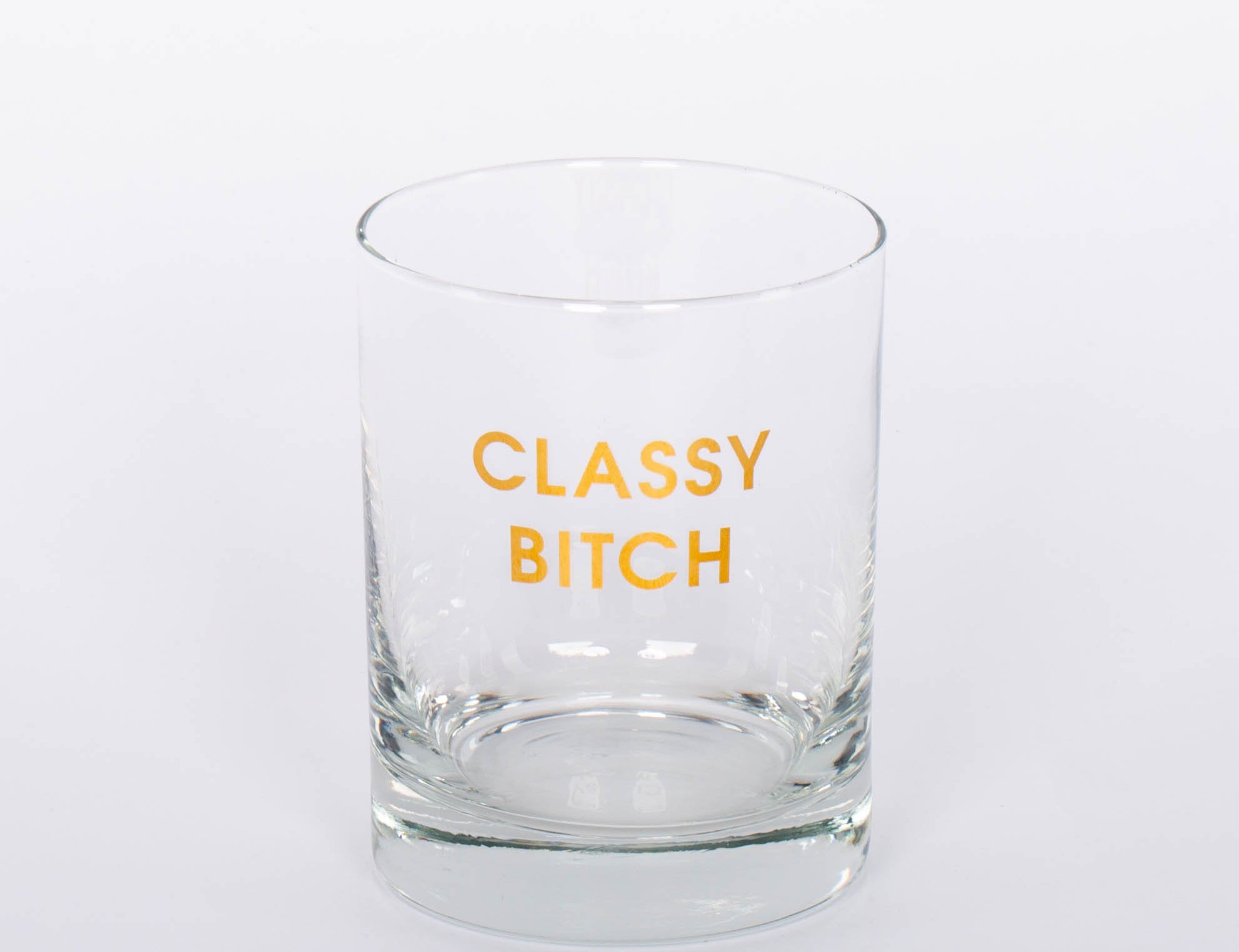 Crush your cocktail in style with our "Classy Bitch" gold foil rocks glass.