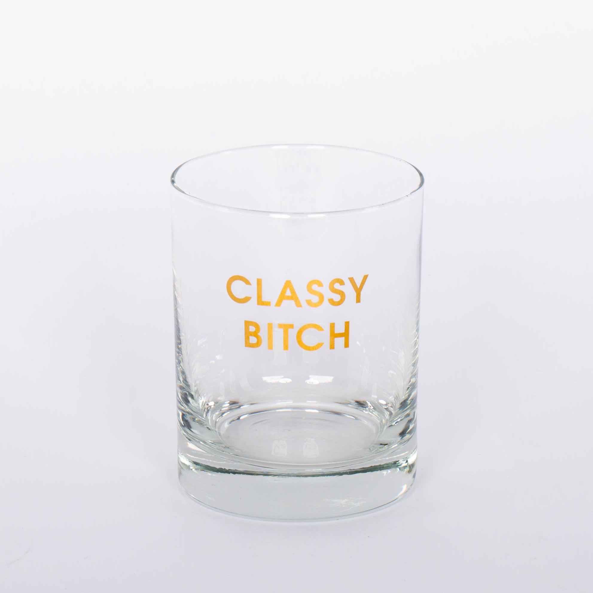 Crush your cocktail in style with our "Classy Bitch" gold foil rocks glass.