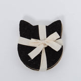 Four pack of 100% Recycled Cat Head Rubber Coaster Set in tan and black by Ore Originals.
