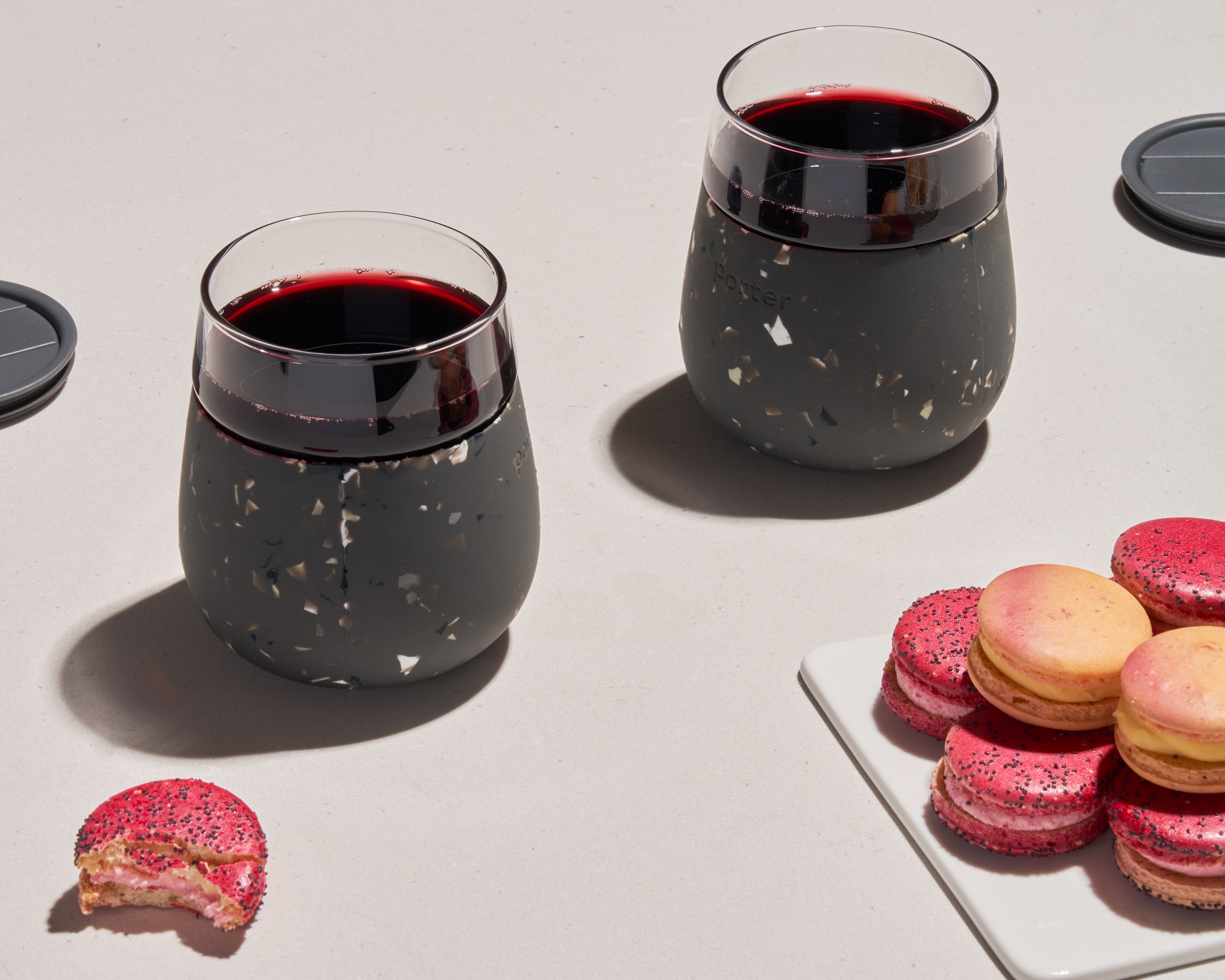 Charcoal Terrazzo Soft silicone wrap over clear glass — this infinitely reusable glass is great for wine, cocktails, & more on the go.