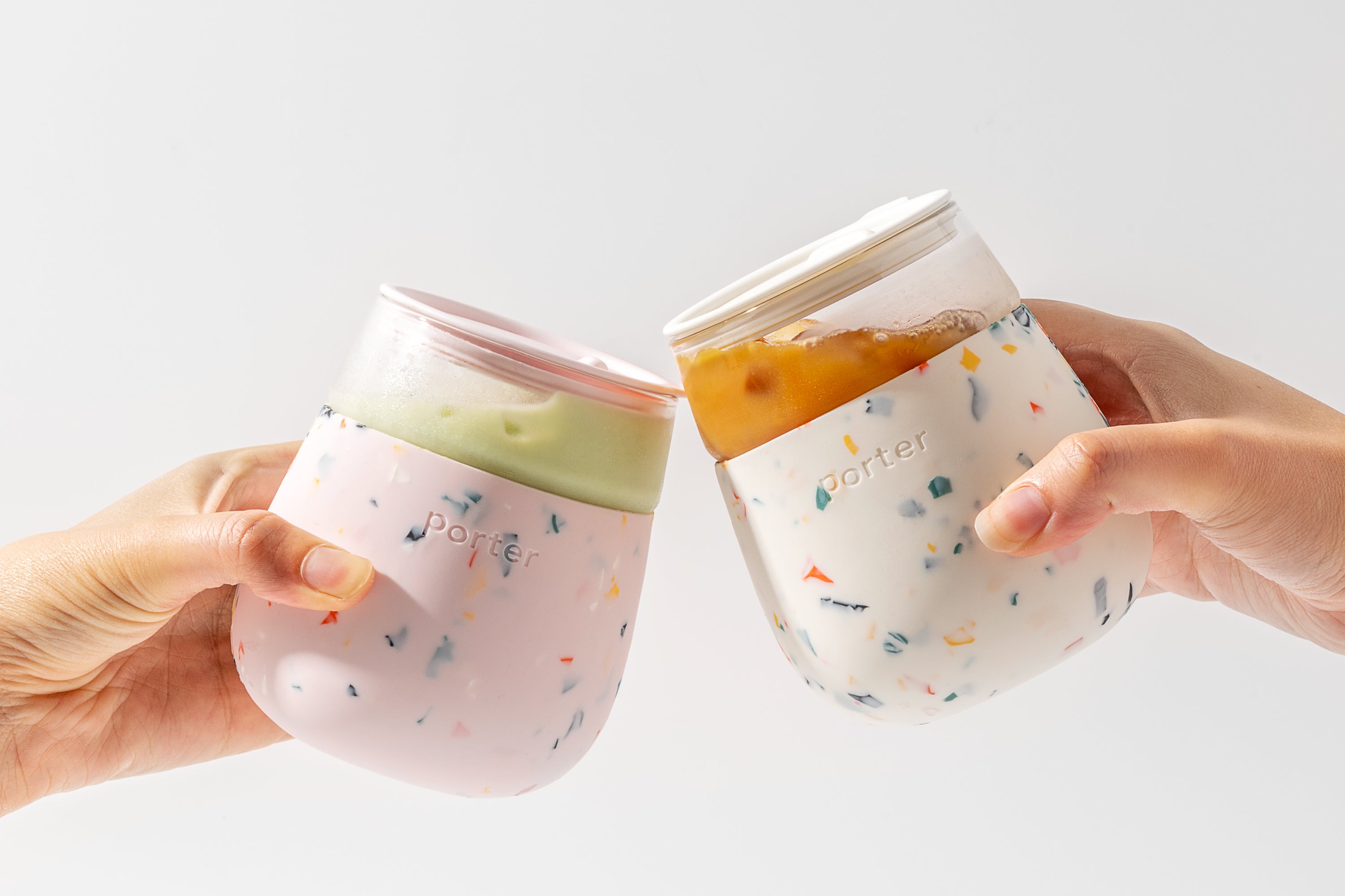 Blush and Cream Terrazzo Soft silicone wrap over clear glass — this infinitely reusable glass is great for wine, cocktails, & more on the go.