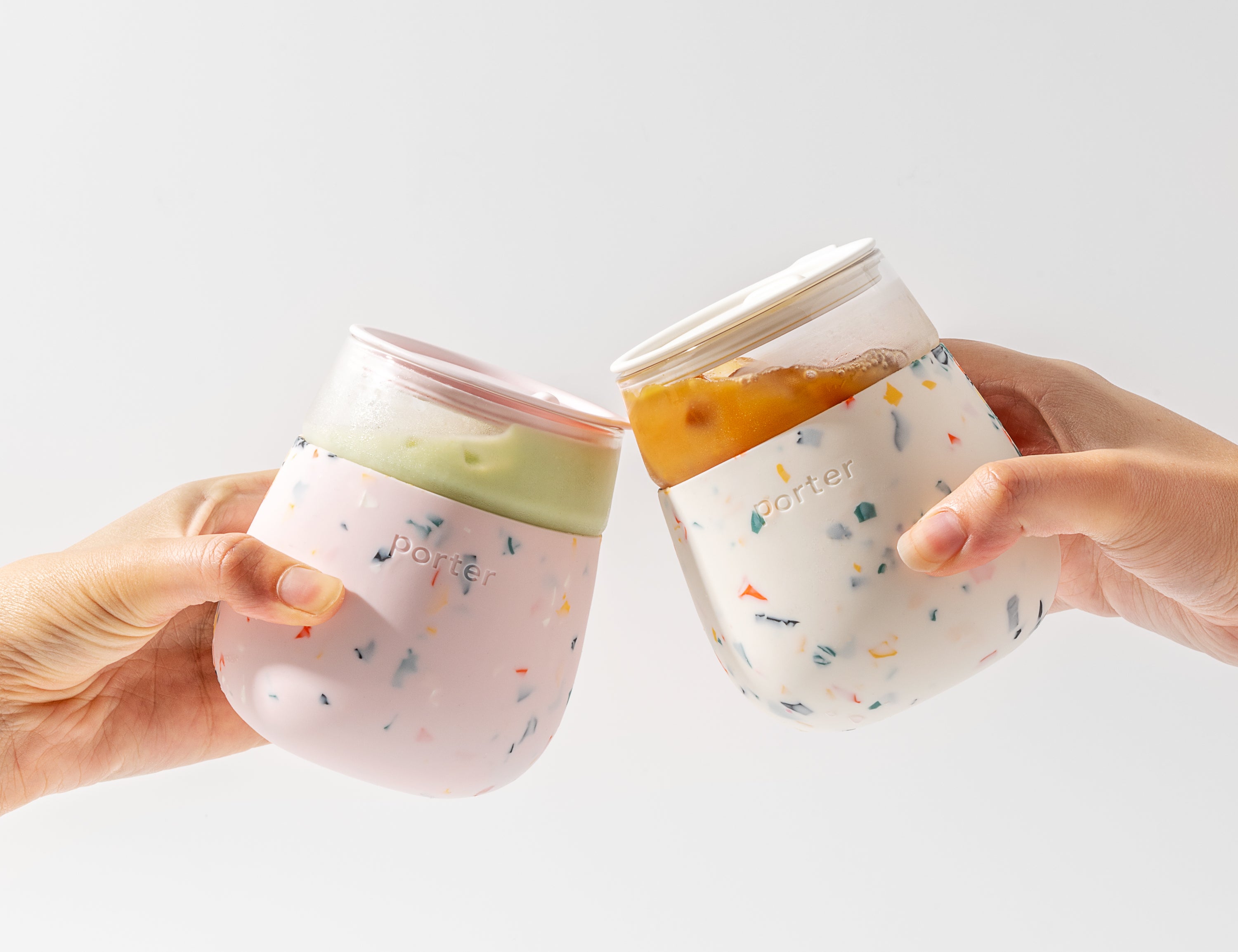 Blush and Cream Terrazzo Soft silicone wrap over clear glass — this infinitely reusable glass is great for wine, cocktails, & more on the go.