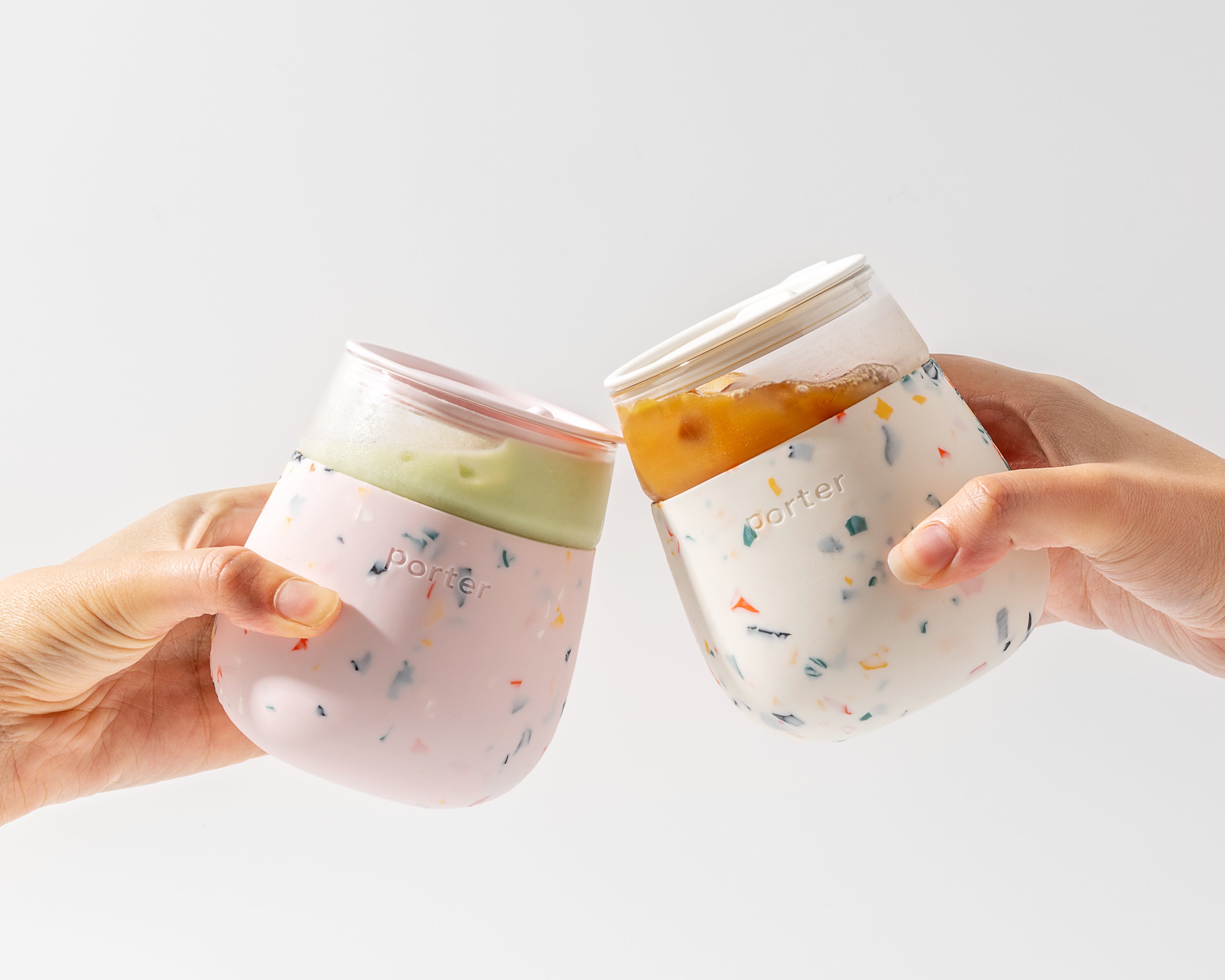 Blush and Cream Terrazzo Soft silicone wrap over clear glass — this infinitely reusable glass is great for wine, cocktails, & more on the go.