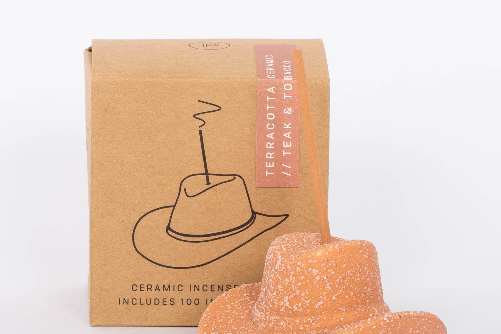 Terracotta Cowboy Hat Incense Holder This vintage-inspired incense burner is on of our favorites! Including 100 fragrant incense sticks of Palo Santo Suede, this ceramic incense holder will keep your space burning with ambiance and fragrant tones.