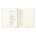 Open book displaying text on a white background