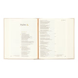 Open book displaying text on a white background