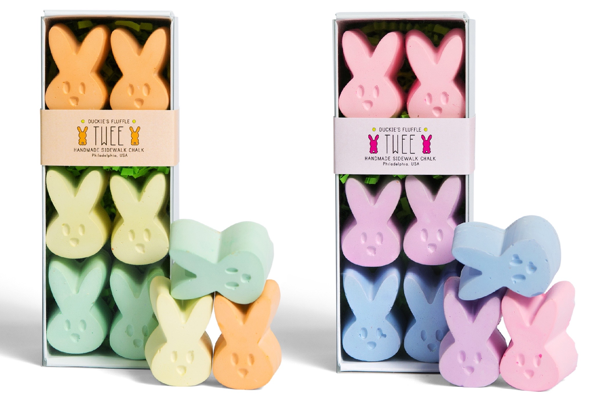 Two boxes of bunny shaped children's chalk. Yellow, orange, green, blue, purple, and pink. White background. TWEE brand.