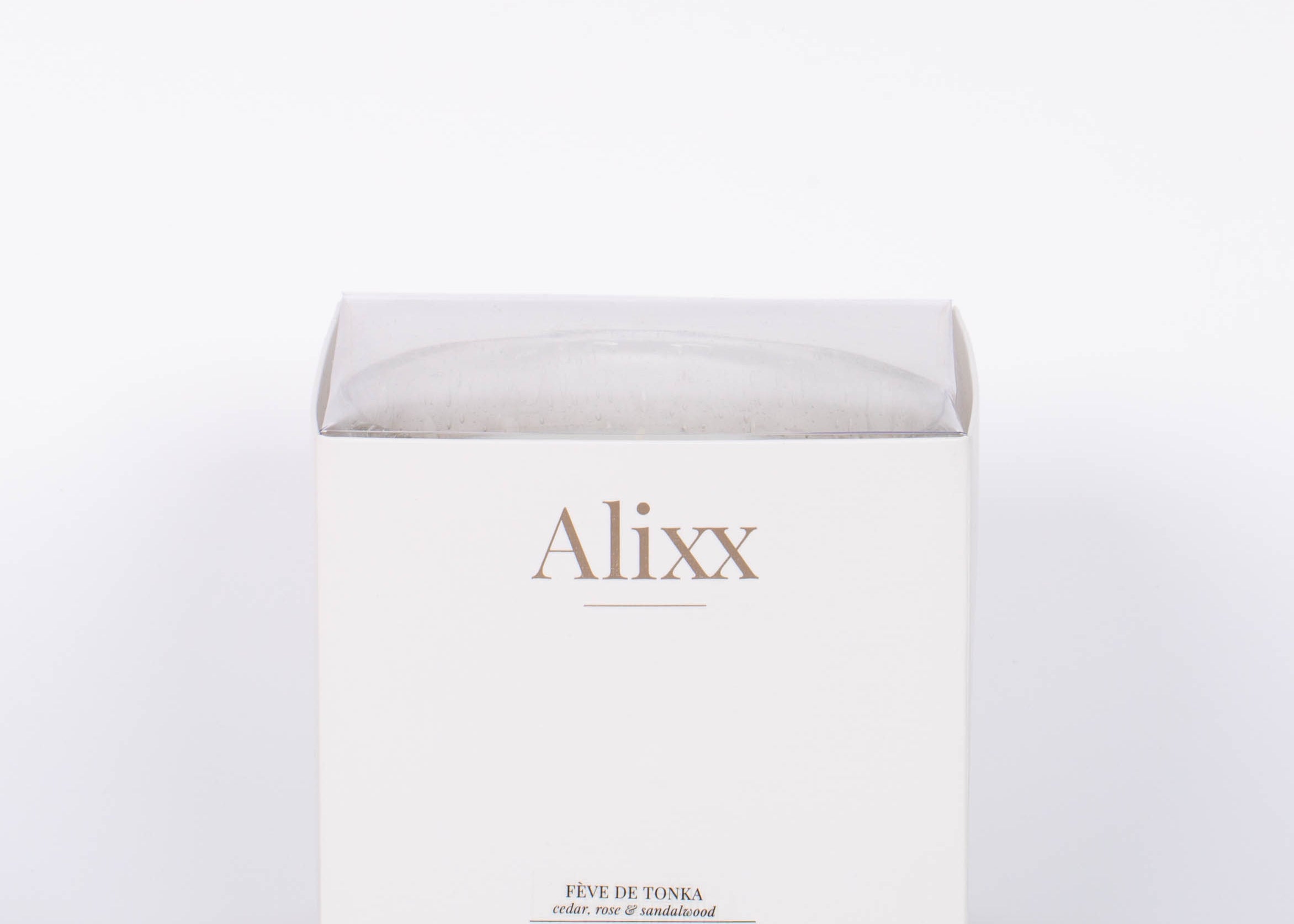 The white box for the 42oz clear bubble glass Feve de Tonke Cylindre by Alixx. White background.