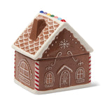 Gingerbread Ceramic House, brown ceramic gingerbread house with white piped icing, candy striped corners and colorful candy dots on the roof