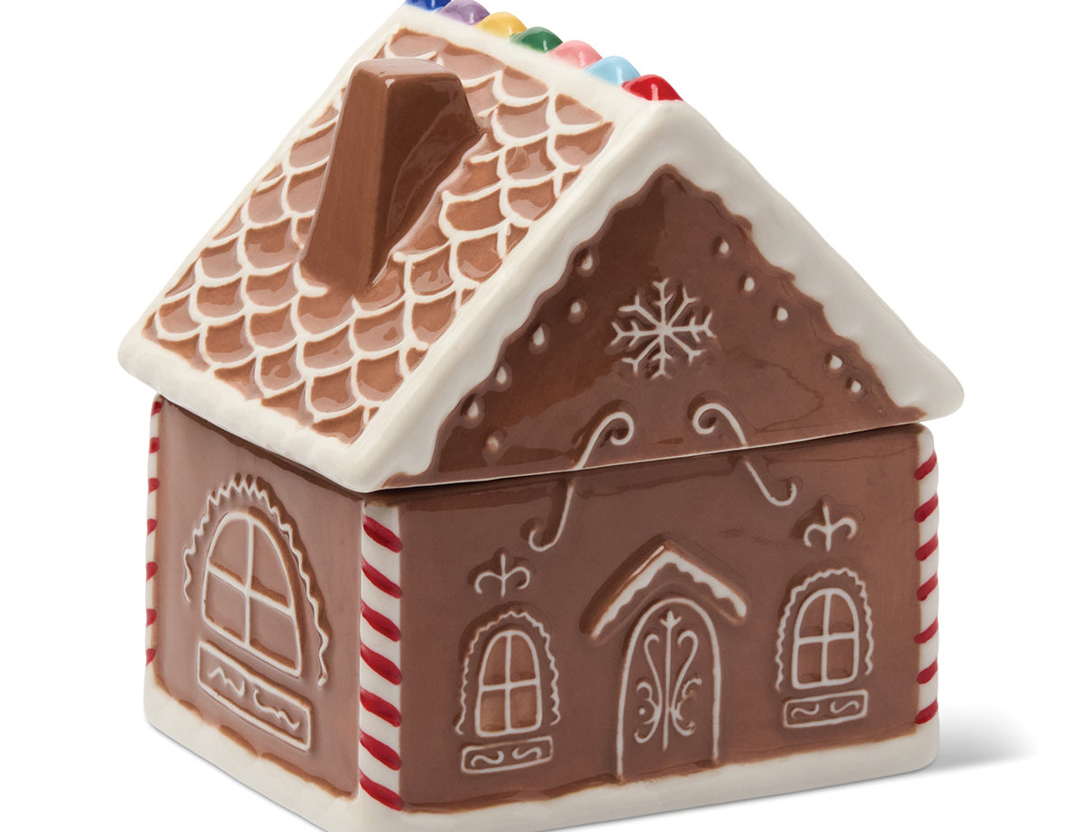 Gingerbread Ceramic House, brown ceramic gingerbread house with white piped icing, candy striped corners and colorful candy dots on the roof