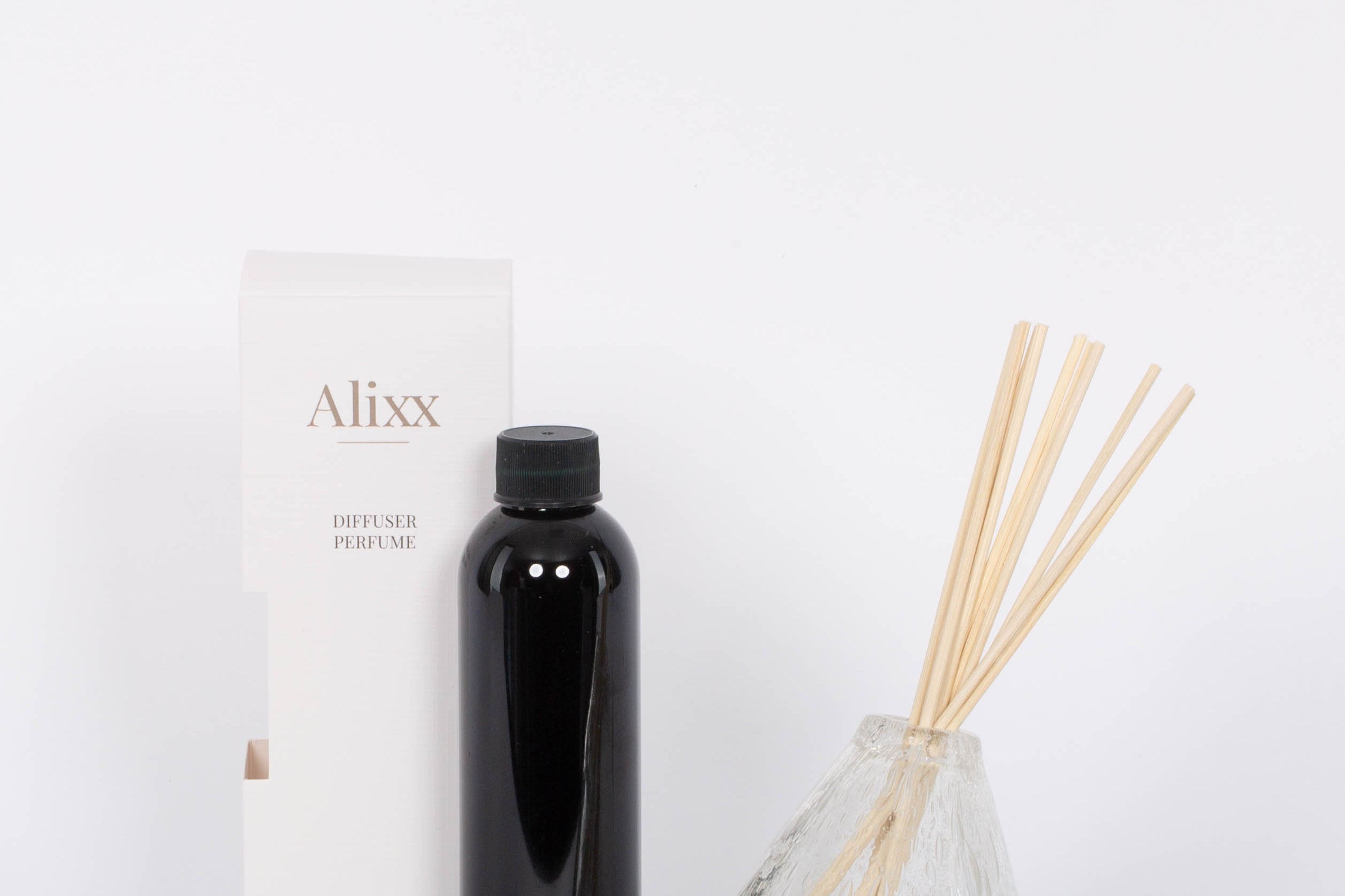 Heure du Thé Diffuser Set by Alixx with vase, scent sticks, and refill bottle. White background. 