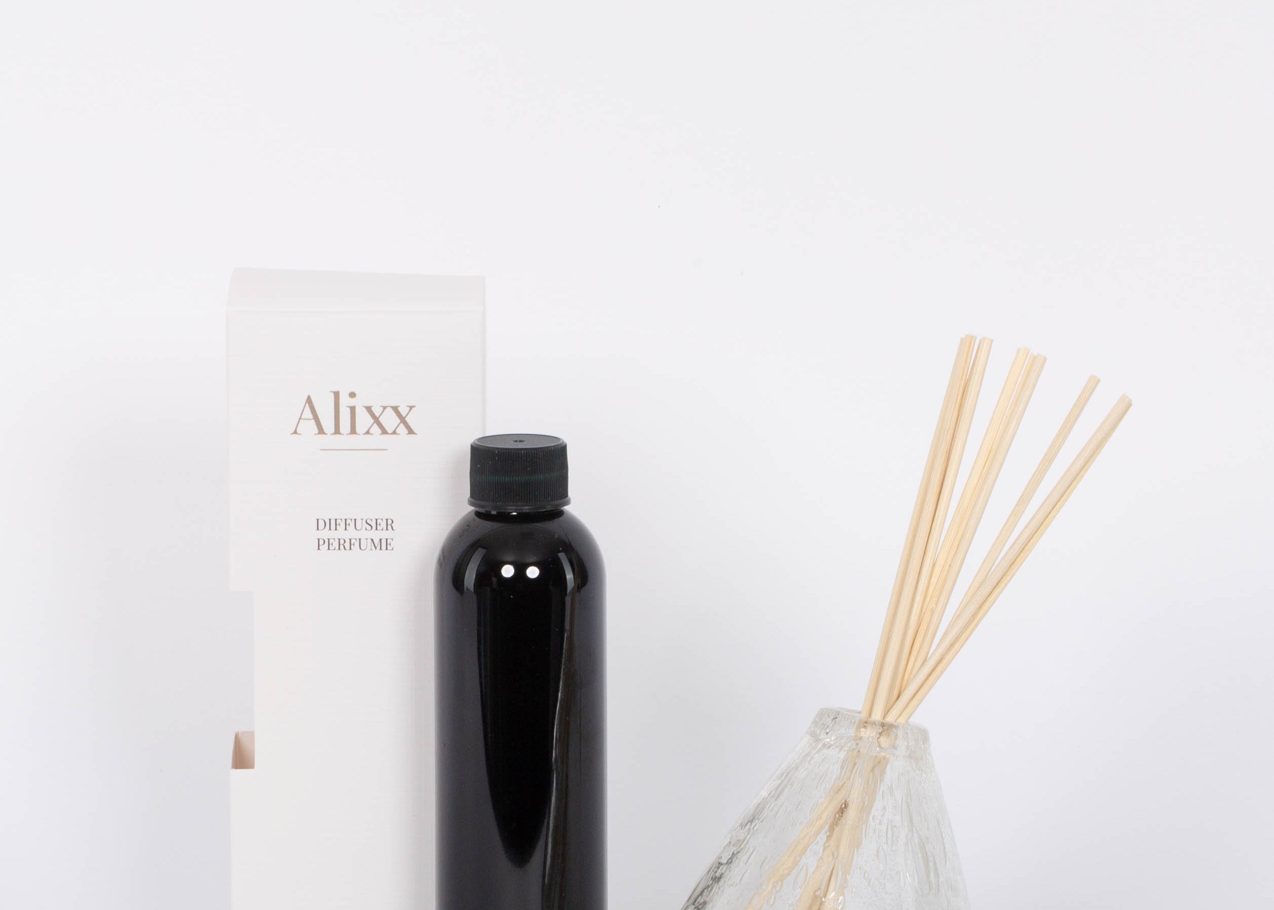 Heure du Thé Diffuser Set by Alixx with vase, scent sticks, and refill bottle. White background. 