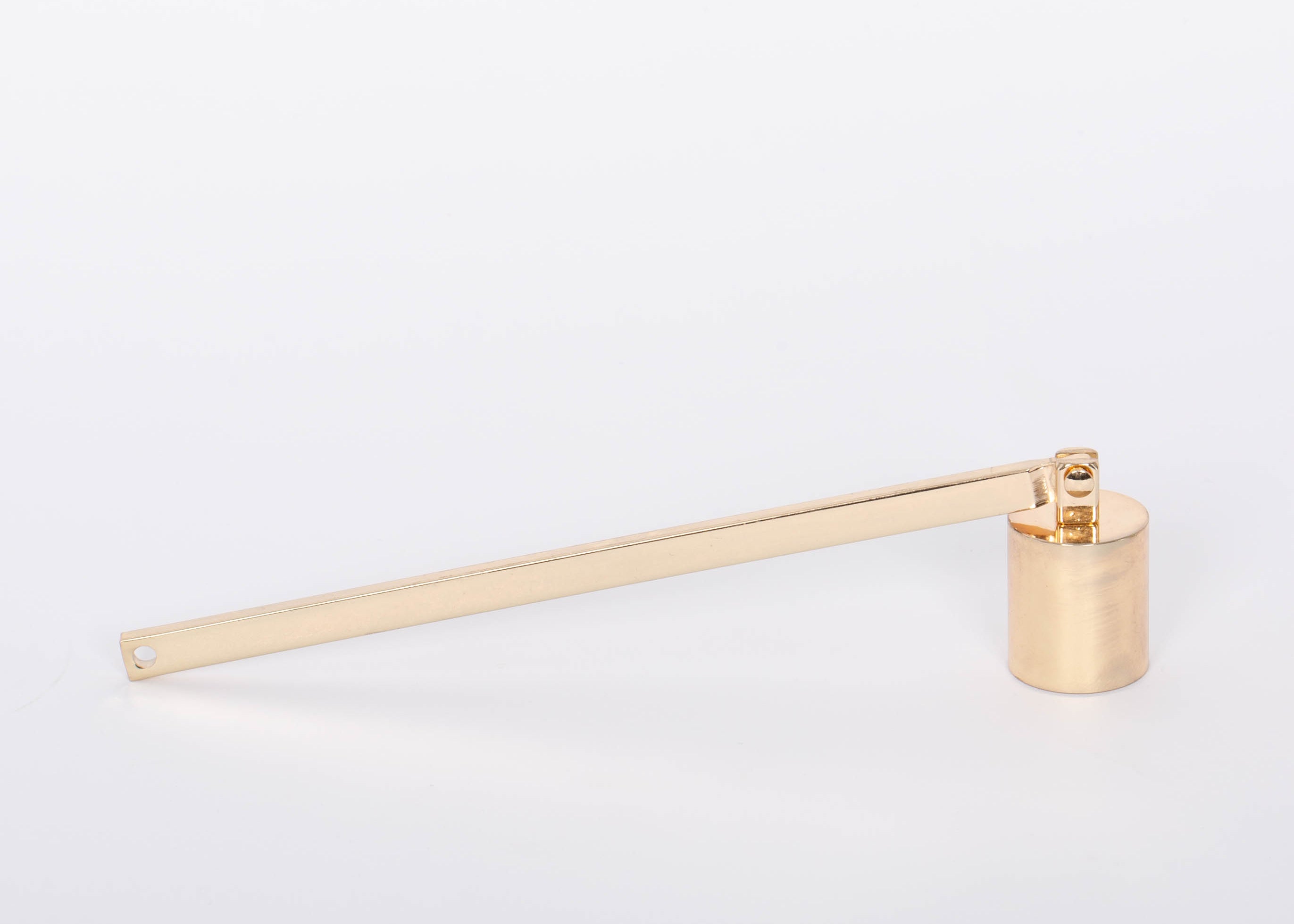 Minimal Golden Candle Snuffer by Designworks. White background.
