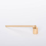 Golden Candle Snuffer by Designworks. White background.