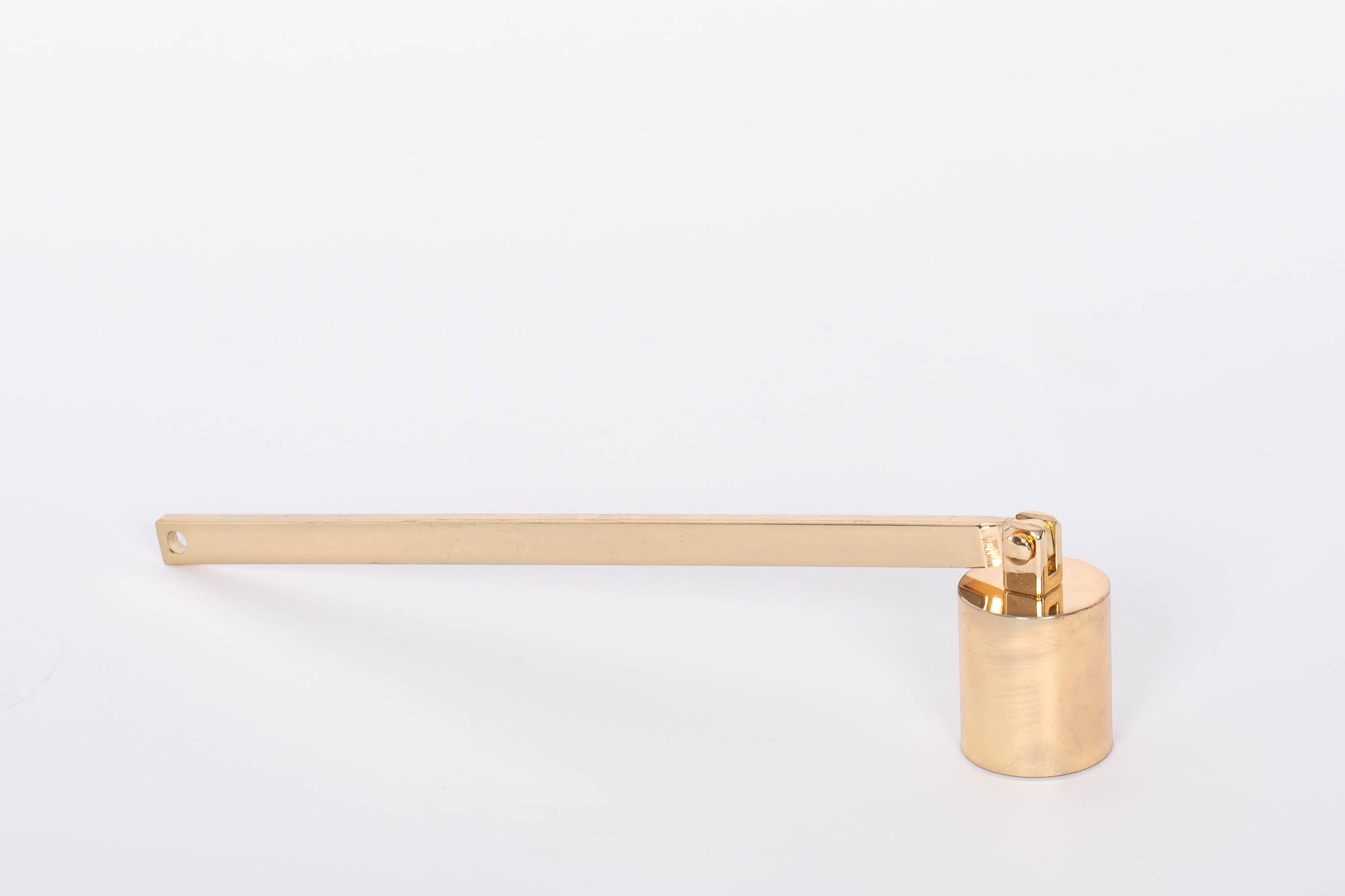 Golden Candle Snuffer by Designworks. White background.