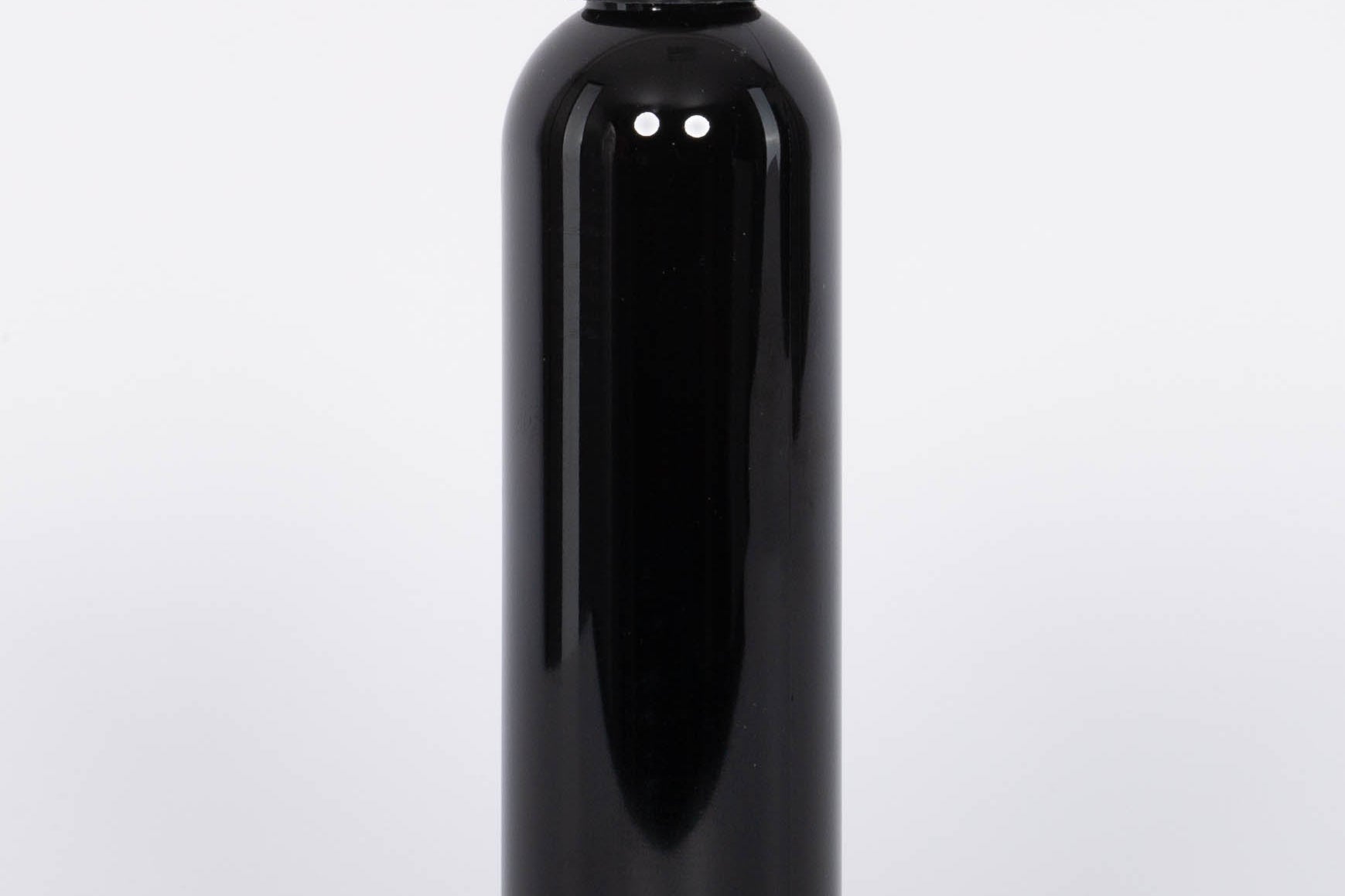 Alixx Heure du The Diffuser Refill with lemon, basil, and musk in a dark bottle. 