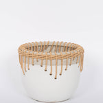 White Hideaway Pot with two tone neutral base and woven rattan detailing around top rim.  White background.