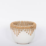 White Hideaway Pot with two tone neutral base and woven rattan detailing around top rim.  White background.