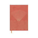 Orangey red Radiant Rays Hard Cover Suede Cloth Journal with pocket, gold geometric design and gold ribbon bookmark. White background. 